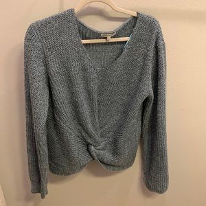 Knotted and knitted sweater